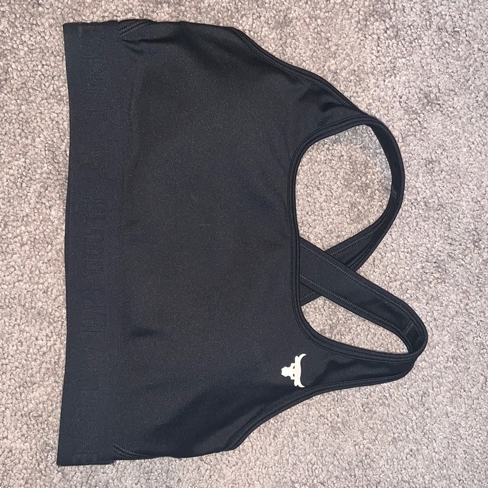 Project rock under armour sports bra. Never worn size medium